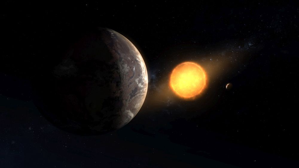 Kepler-1649c is seen orbiting around its red dwarf star with a smaller planet visible on the right.